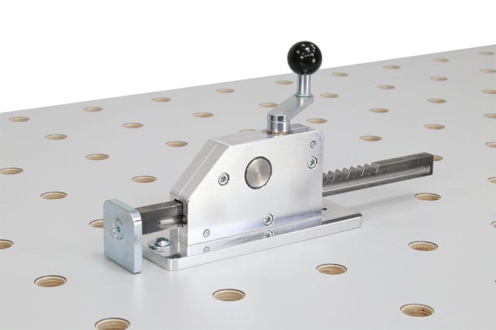 Spennanordning med lite tannstangsgir til hullplatebord, pris pr. stk.